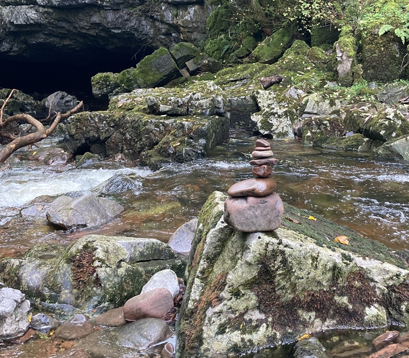 Stack of stones beside river